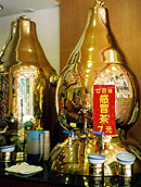 Herbal decoctions sold in restaurants are often kept in big containers.