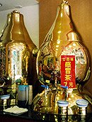 Herbal decoctions sold in restaurants are often kept in big containers.