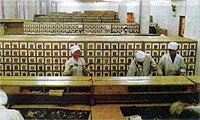 A busy herbal pharmacy in one of Beijing's TCM hosptials showing different herbs used in tonic preparations.